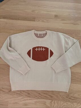 Women’s Cream Crewneck Sweater with Rust Football Motif